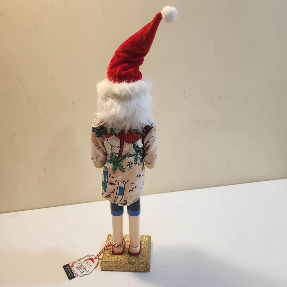 Wooden nutcracker styled as a Beachy  Santa Claus W/floral shirt, sunglasses
